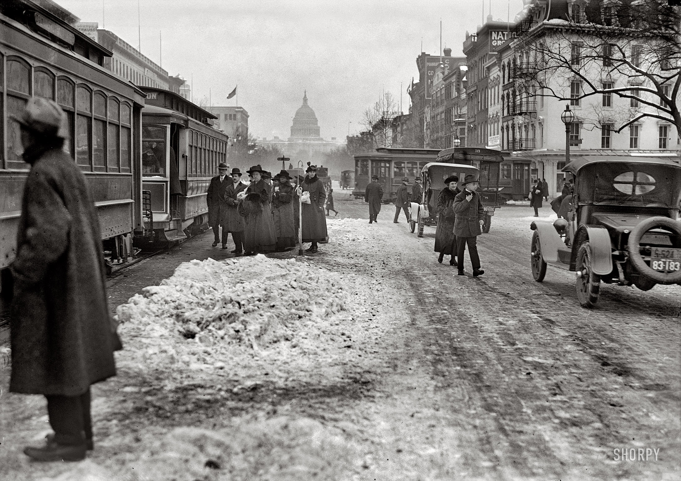 Washington, D.C., circa 1918. "Pennsylvania Avenue with snow." Everyone grab a shovel and start digging! Harris & Ewing glass negative. View full size.