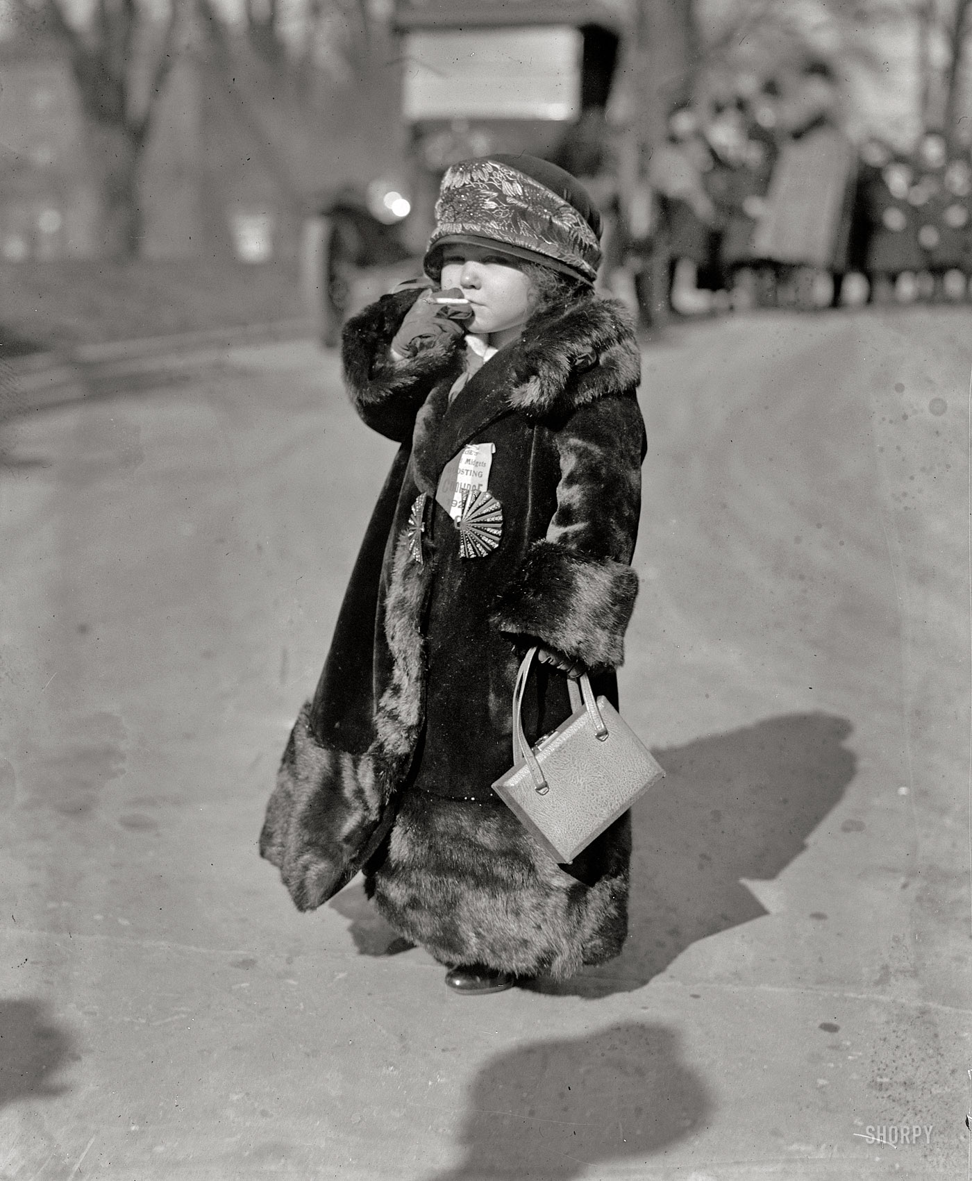 January 23, 1924. Washington, D.C. "Midget." News item, Jan. 20:  "The first organized touring Coolidge Marching Club to work for the nomination of the president comes to Washington Sunday morning. It is composed of 25 European midgets, headed by I.S. Rose, New Englander and impresario. The midgets wear buttons and ribbons on which is inscribed 'Coolidge 1925.'" View full size.