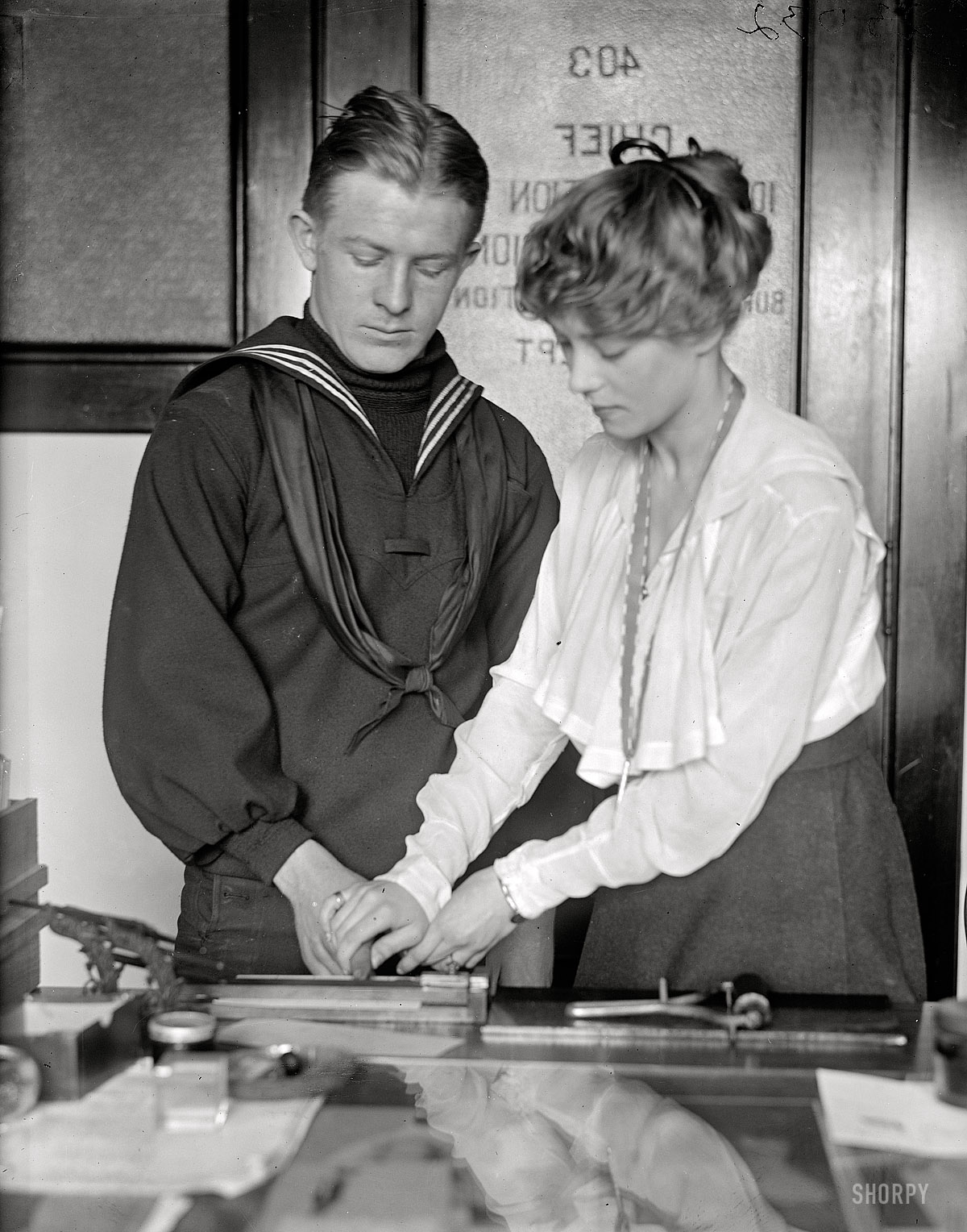 Washington, 1918. "U.S. Navy Intelligence Bureau. Fingerprint department clerks James A. Noonan, Mrs. G.G. Boswell." Harris & Ewing glass neg. View full size.