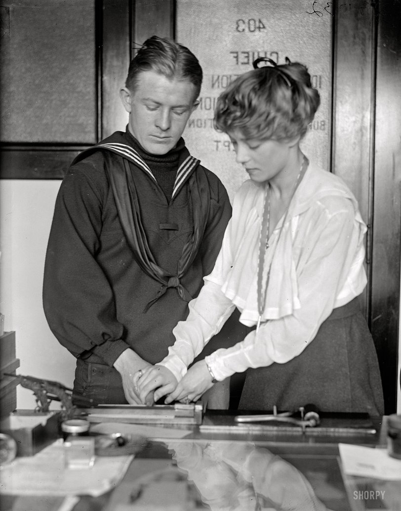 Washington, 1918. "U.S. Navy Intelligence Bureau. Fingerprint department clerks James A. Noonan, Mrs. G.G. Boswell." Harris &amp; Ewing glass neg. View full size.
