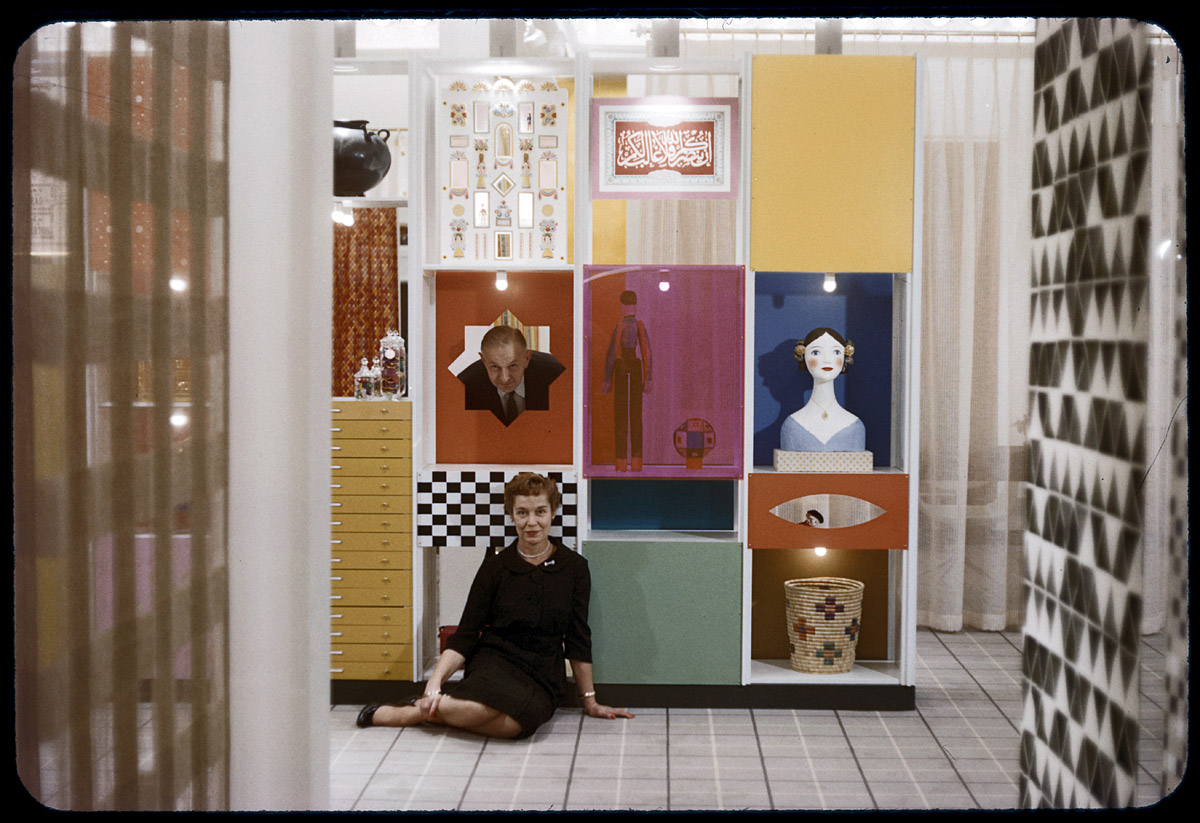 1958. Alexander and Susan Girard at the Herman Miller show in San Francisco. View larger. 35mm Kodachrome transparency, Charles & Ray Eames collection.