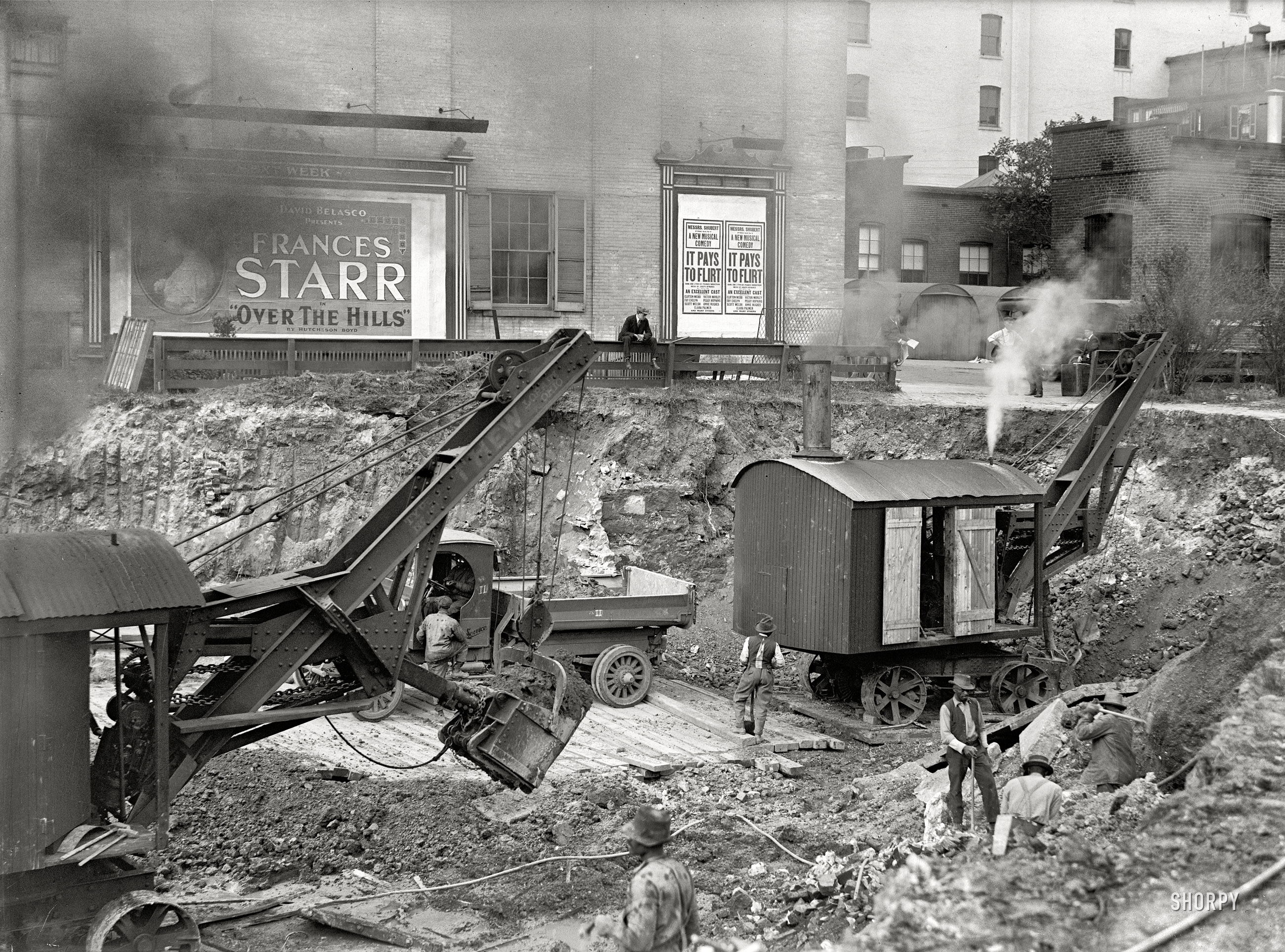 Washington, D.C., April 1918. "Downtown construction." Excavation with a theatrical backdrop. Harris & Ewing Collection glass negative. View full size.