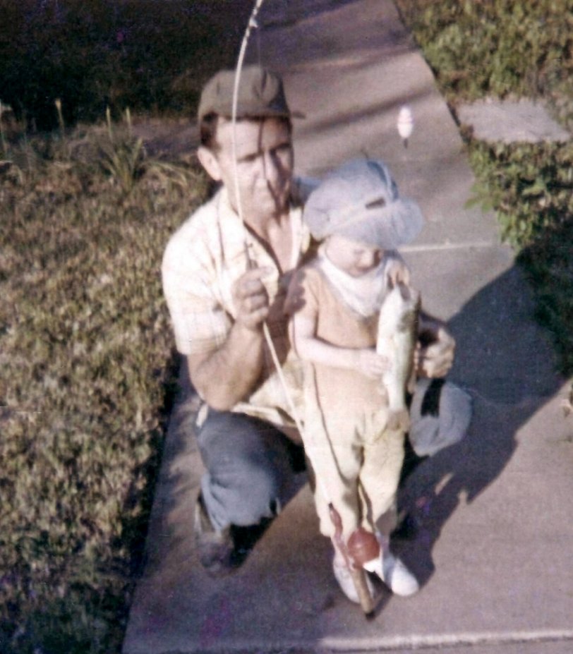 My grandfather and I in 1972 with the first fish I ever "caught."
