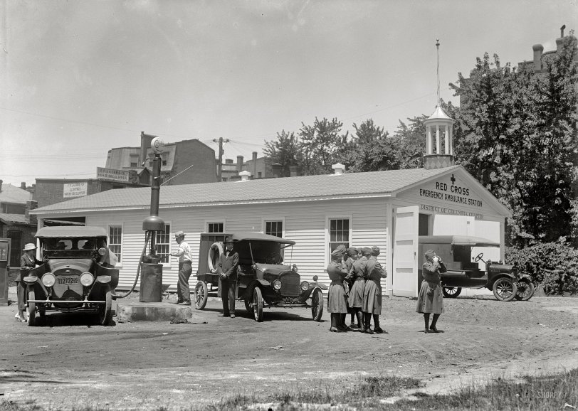 1917. Washington, D.C. "Red Cross emergency ambulance station garage, 16th Street," conveniently next door to F.P. Jacobs, "electric horse-dog clipper."  Harris &amp; Ewing Collection glass negative, Library of Congress. View full size.
