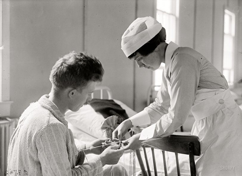 Nurse and patient at Walter Reed Army Hospital circa 1918 in Washington, D.C. Harris &amp; Ewing Collection glass negative. View full size.

