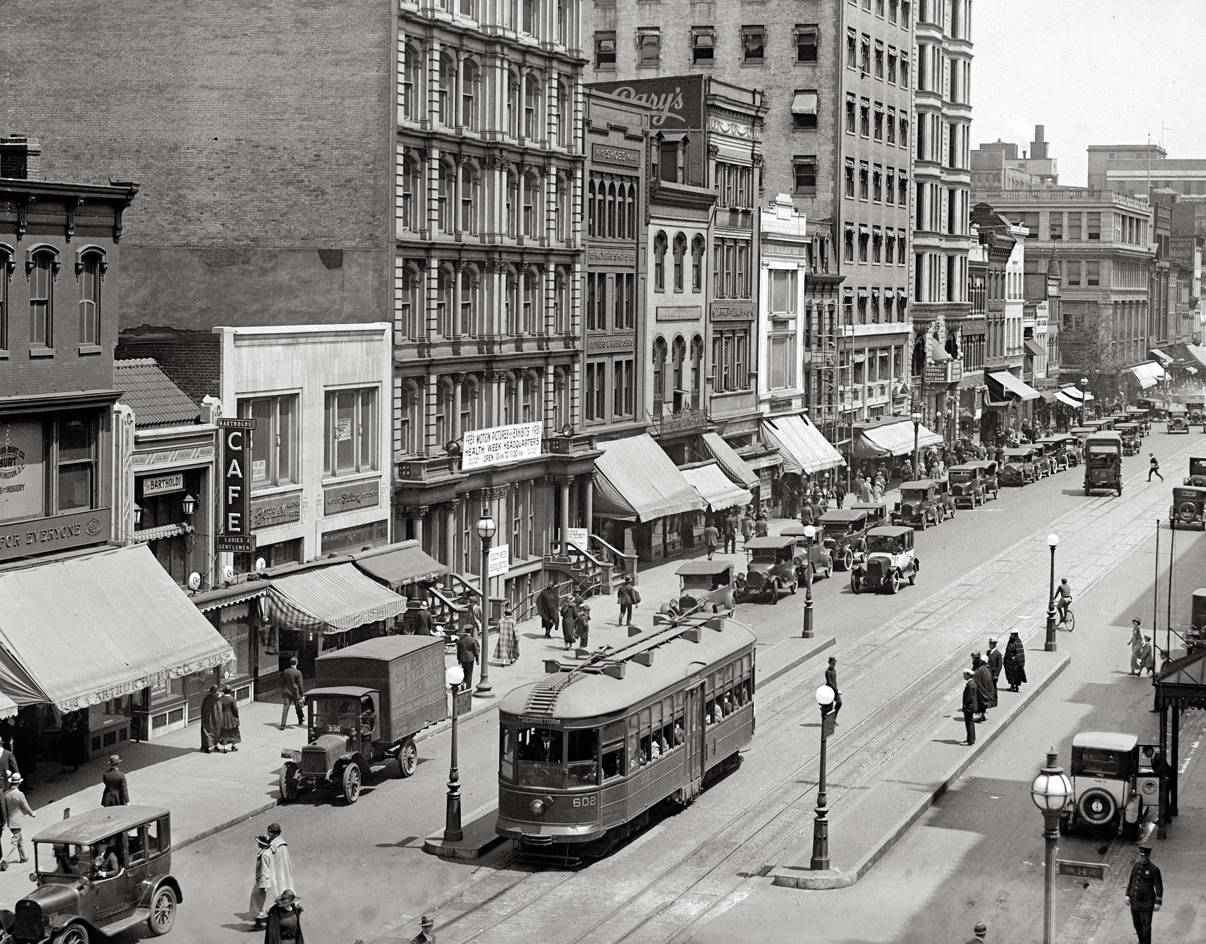 Today we're leaving the office and taking the streetcar downtown for some shopping.  From 1924, "F Street N.W. from 14th Street." View full size.