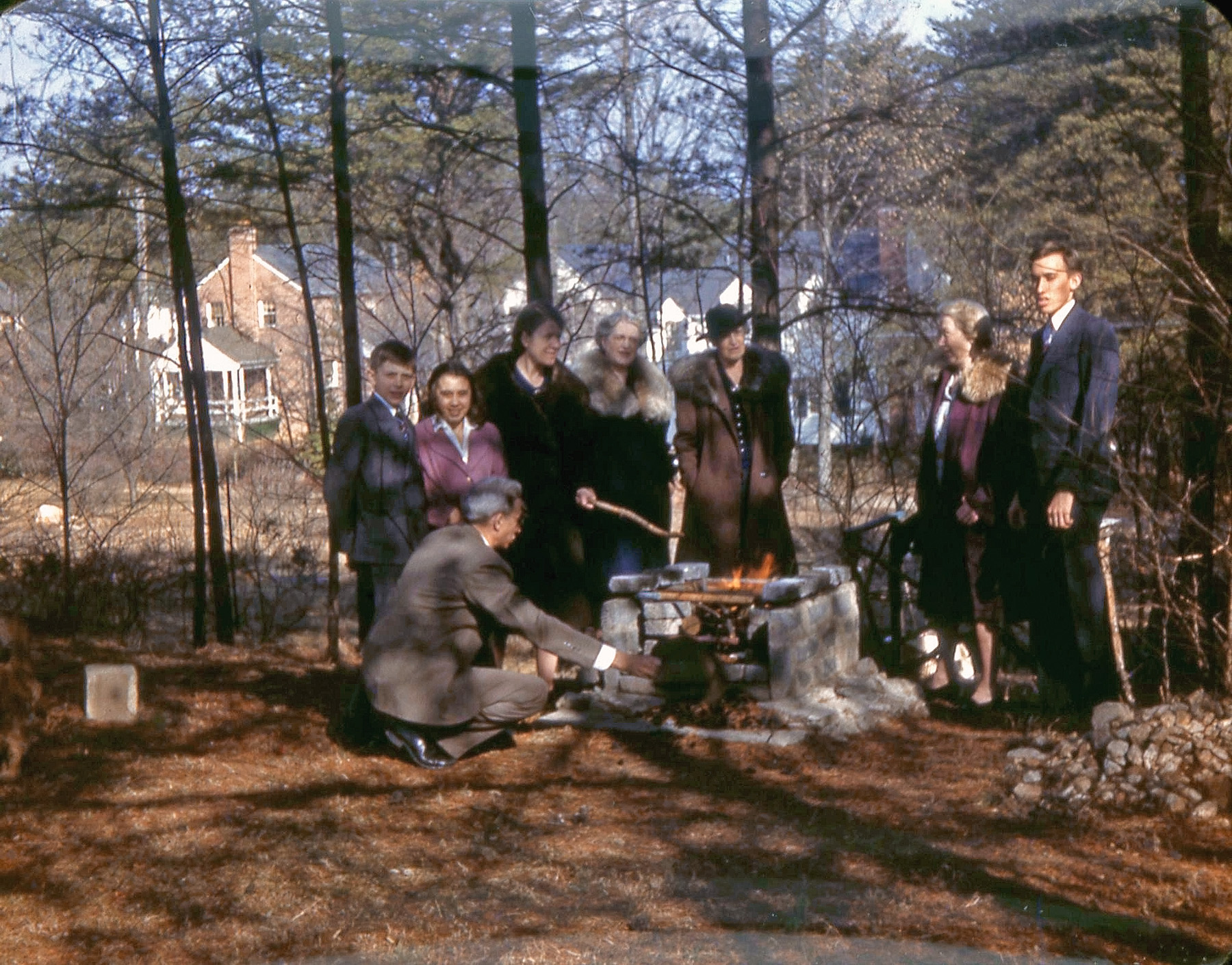 Autumn of 1941 at Uncle Carp's, North Chevy Chase, Maryland. People are Bobby Carpenter (me), cousin Harriet Carpenter, Margaret (Johnson) Carpenter, Aunt Esther Johnson, Grandmother Johnson, Aunt Florence Carpenter, cousin Frank Carpenter. Charles (Uncle Carp) Carpenter kneeling at fire. View full size.