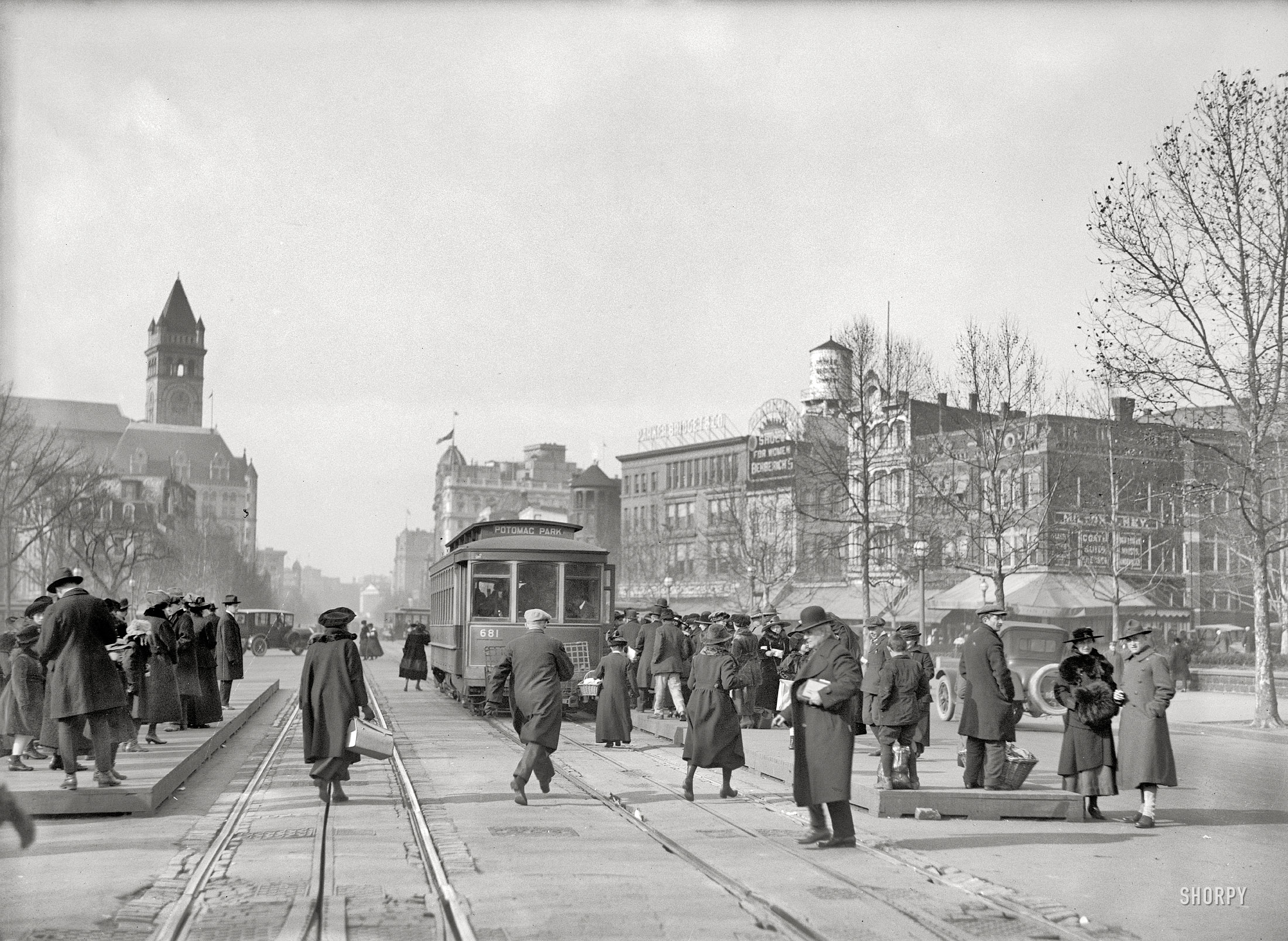 Washington, D.C., circa 1919. "Street scene, Pennsylvania Avenue." Here we see the tower of the Old Post Office as well as a number of vanished Washington landmarks including the Parker Bridget department store. View full size.
