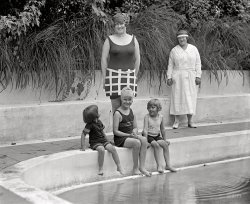 July 7, 1924. Washington, D.C. "Madame Prochnik and children." Gretchen Prochnik, wife of the Austrian charge d'affaires, poolside with some little friends. National Photo Company Collection glass negative. View full size.