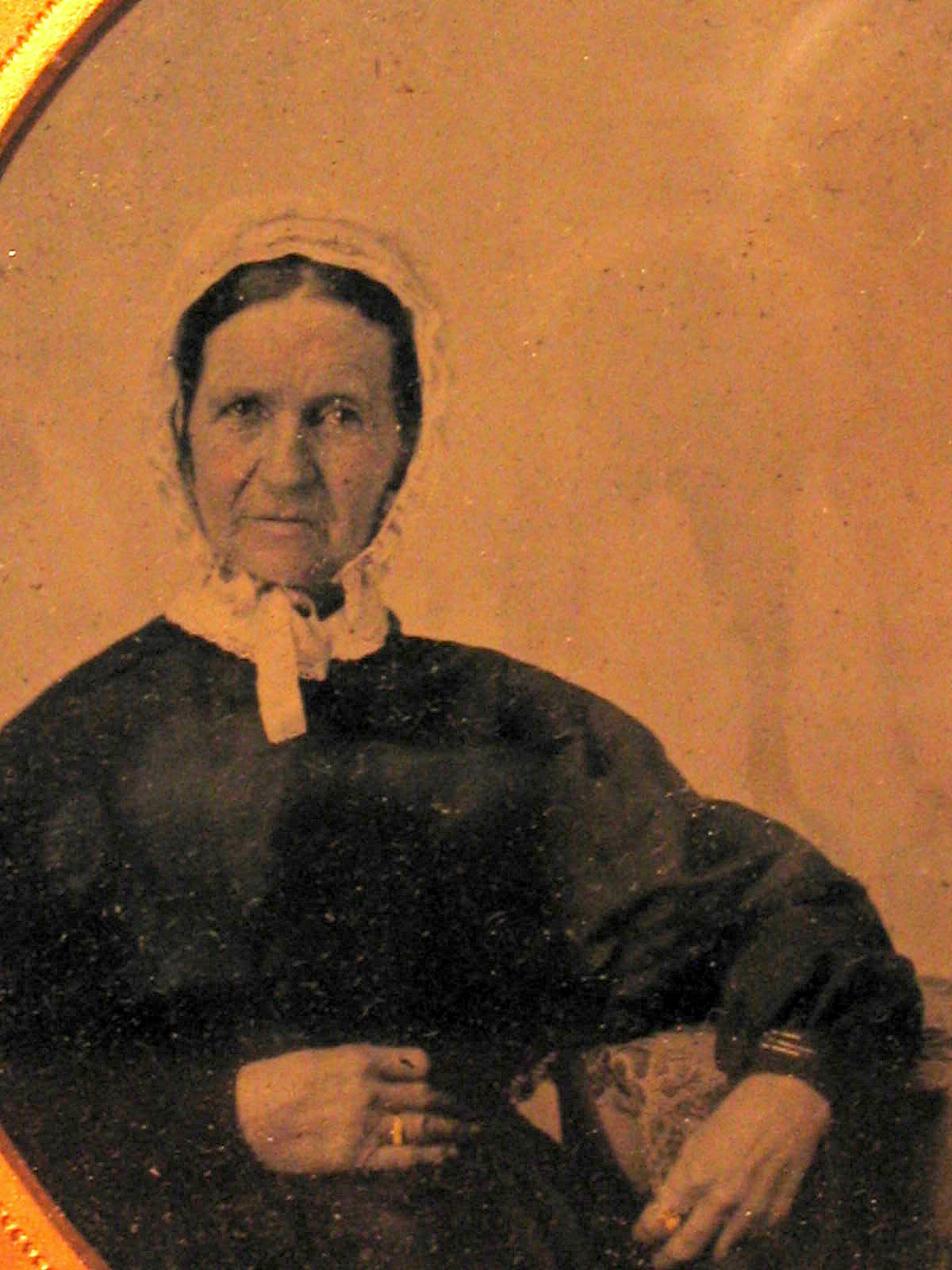 Ambrotype of my great-great-great-grandmother, Minerva Rose Jones, wife of William Jones. Born in New York State about 1800, died in Illinois, Dec. 23, 1884. Buried in Uniontown Cemetery, Uniontown, Knox County, Illinois. Her son, Ephraim R. Jones was an early-day portrait photographer, and this may be his work. View full size.