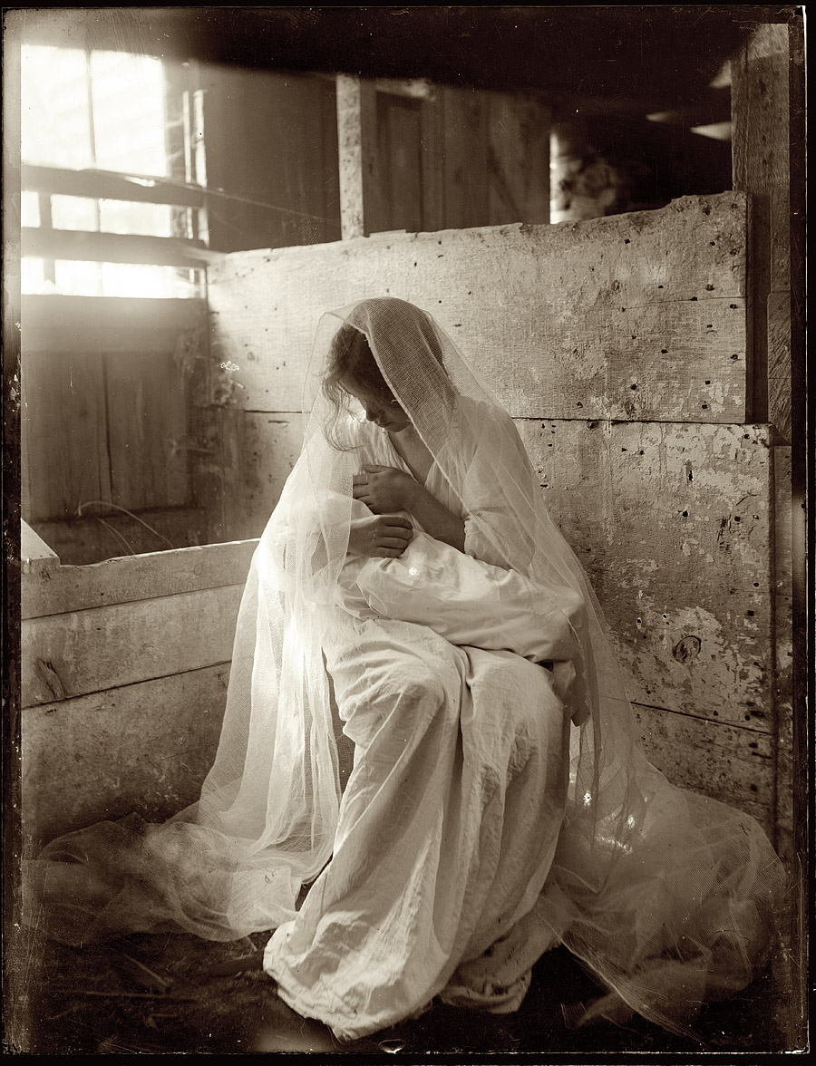 Newport, Rhode Island, 1901. "The Manger. Experimental portrait showing values of white against white, featuring a young woman holding a baby." 8x10 dry-plate glass negative by Gertrude Käsebier. View full size.