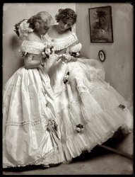 "The Letter." New York, 1906. Studio portrait of the Gerson sisters in costume for the Crinoline Ball. 8x10 glass negative by Gertrude Käsebier. View full size.