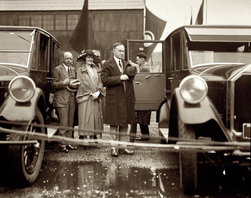 1924. Washington, D.C. "President and Mrs. Coolidge at Bolling Field." National Photo Company Collection glass negative. View full size.
