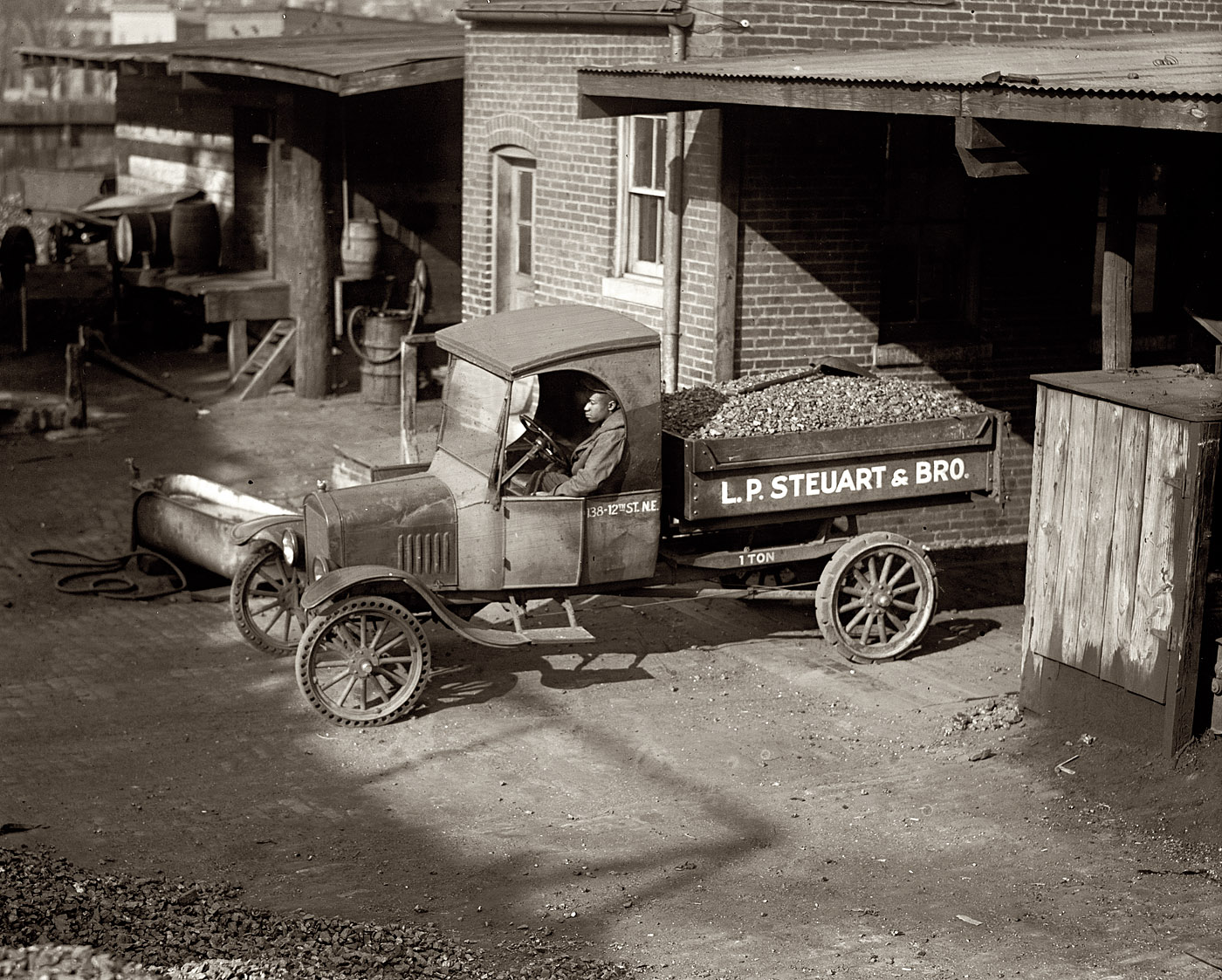 1924. "Ford Motor Co. (L.P. Steuart & Bro.)." Our third entry in National Photo's Fords-in-Washington series -- a coal delivery truck at the L.P. Steuart depot, 138 12th Street NE. View full size. National Photo Company glass negative.