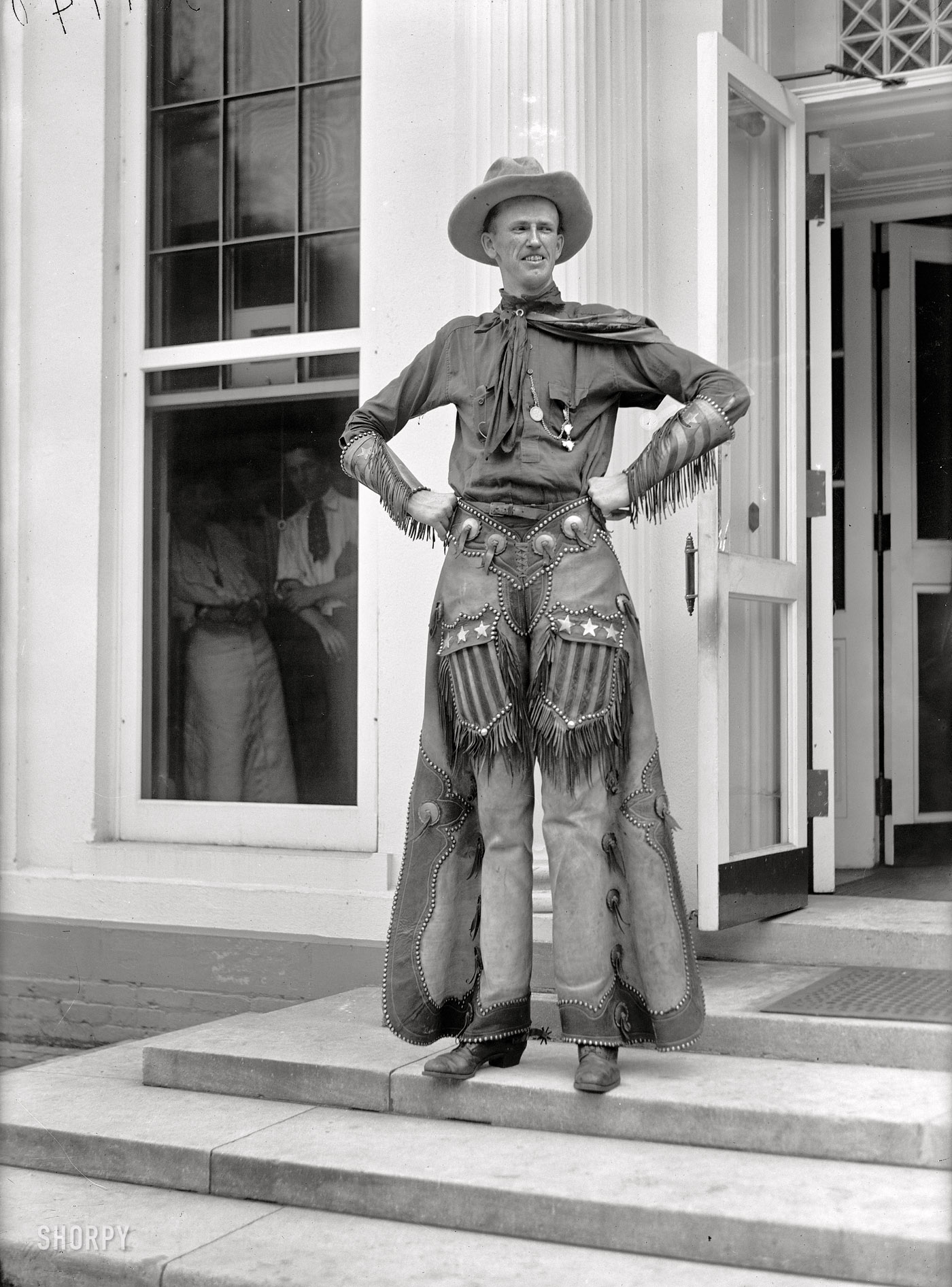 Washington, D.C., 1919. "Ralph E. Madsen, the tall cowboy, at White House." Harris & Ewing Collection glass negative. View full size.