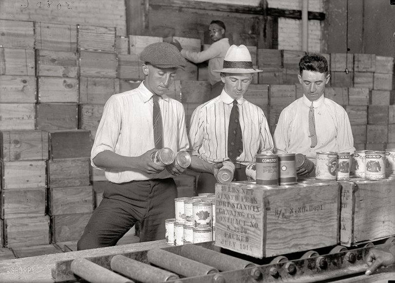 Washington, D.C., 1919. "Buying Army surplus food sold at fish market." Harris &amp; Ewing Collection glass negative, Library of Congress. View full size.
