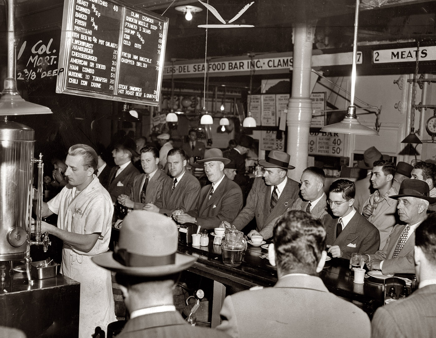 1950. Pete's Bar at Washington Market in Lower Manhattan. Photo by Al Aumuller, New York World-Telegram & Sun. View full size.