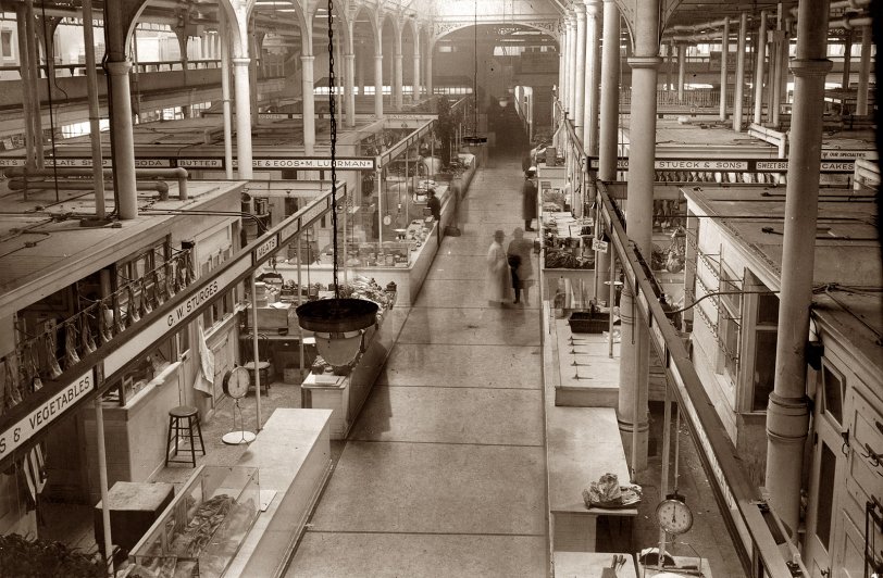 Interior retail stalls at Washington Market in New York City in 1917. New York Word-Telegram & Sun Newspaper Collection. View full size.