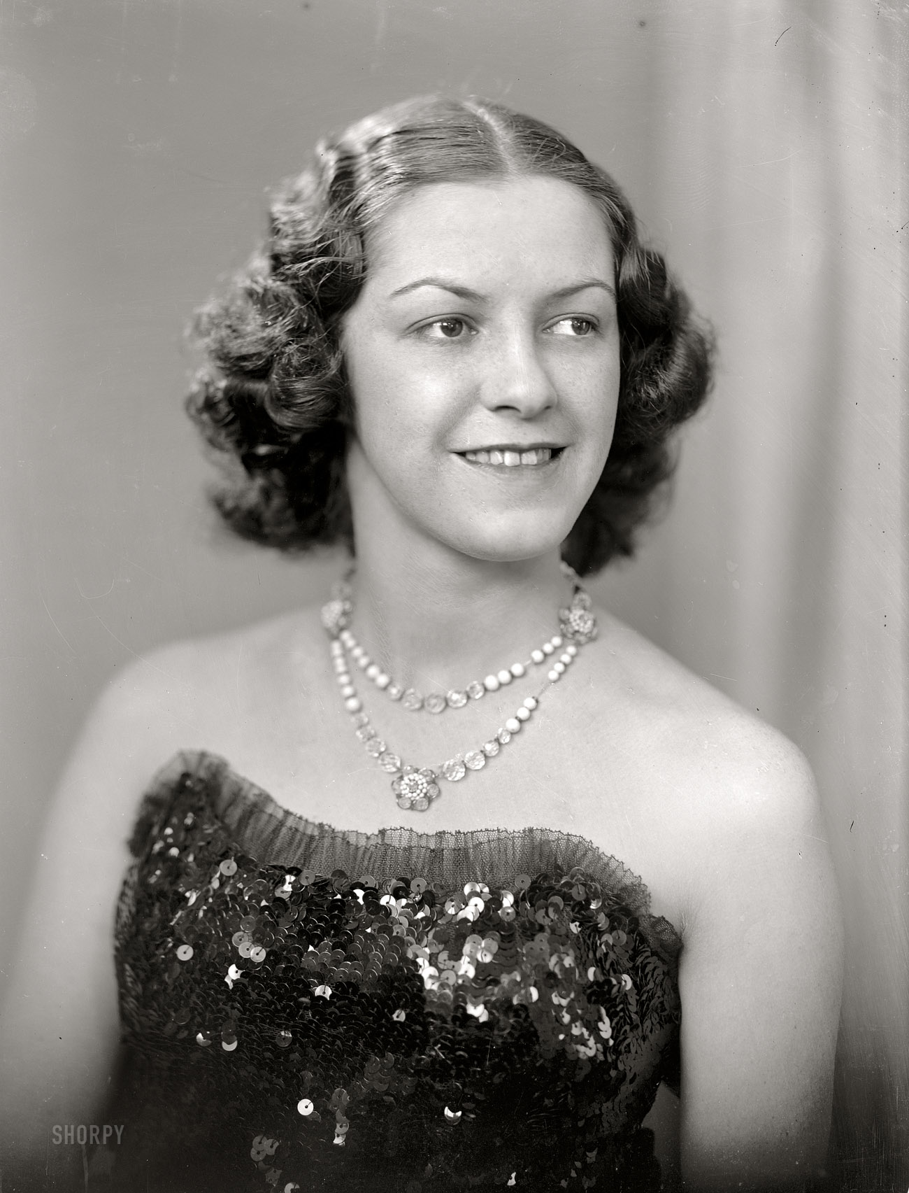 "Miss Adrianne Henderson, 1939." Harris & Ewing glass negative. View full size.