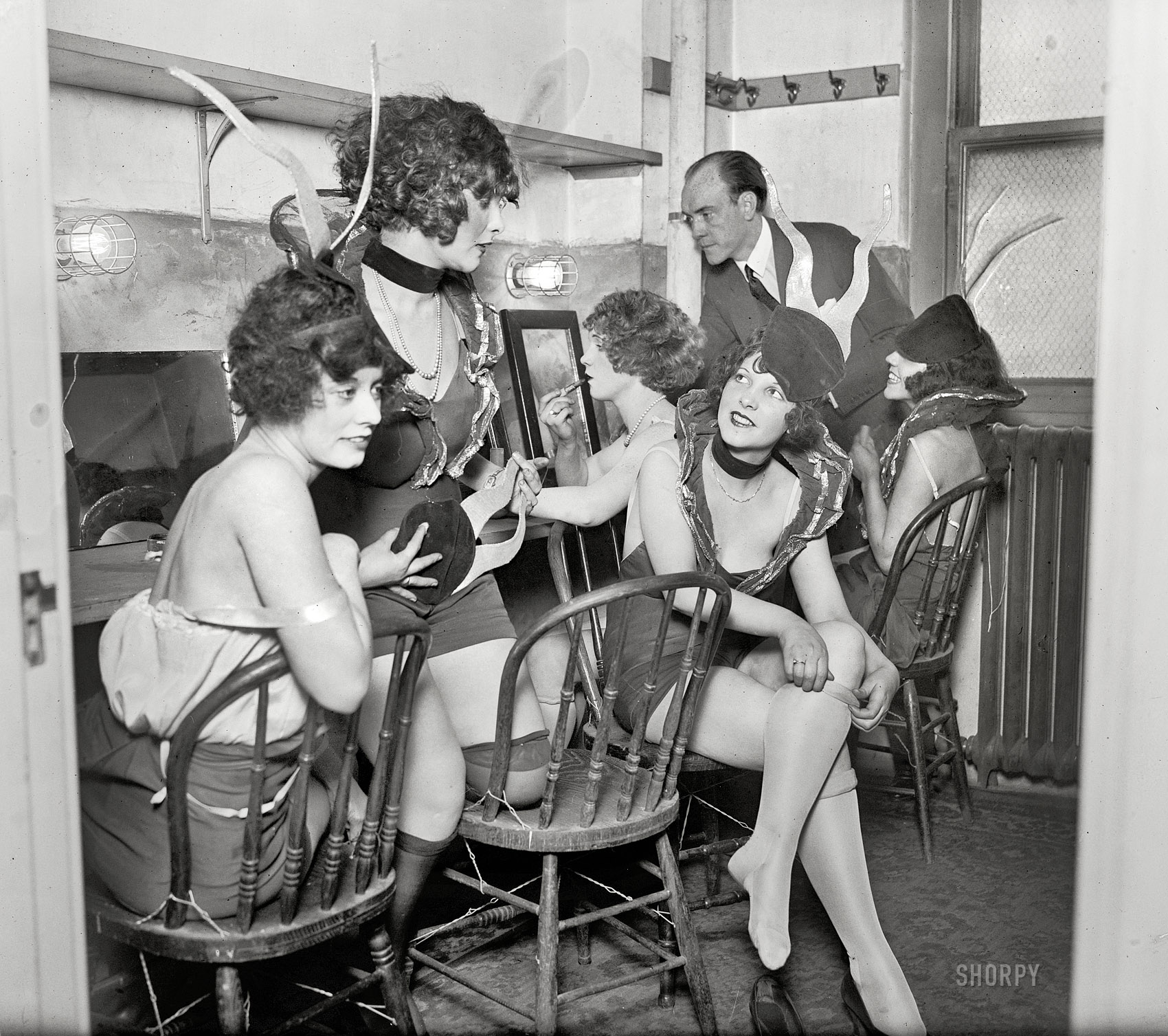 January 26, 1925. Washington, D.C. "National Theater. Earl Carroll instructing showgirls in Vanities." More of the Broadway showman and considerably more of his performers. For a decade or so, annual productions of Earl Carroll's Vanities ("Through these portals pass the most beautiful girls in the world") were a staple of the theatrical stage, "treading the fine line between titillation and indecency," as one reviewer put it. National Photo Company glass negative. View full size.