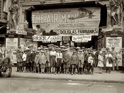 1925. Sidney Lust's Leader Theater at 507 Ninth Street NW in Washington, D.C. National Photo Company Collection glass negative. Buy fine-art print.
ManhoodWhat was the age at which a boy was finally allowed to change his shorts for a pair of real trousers?
