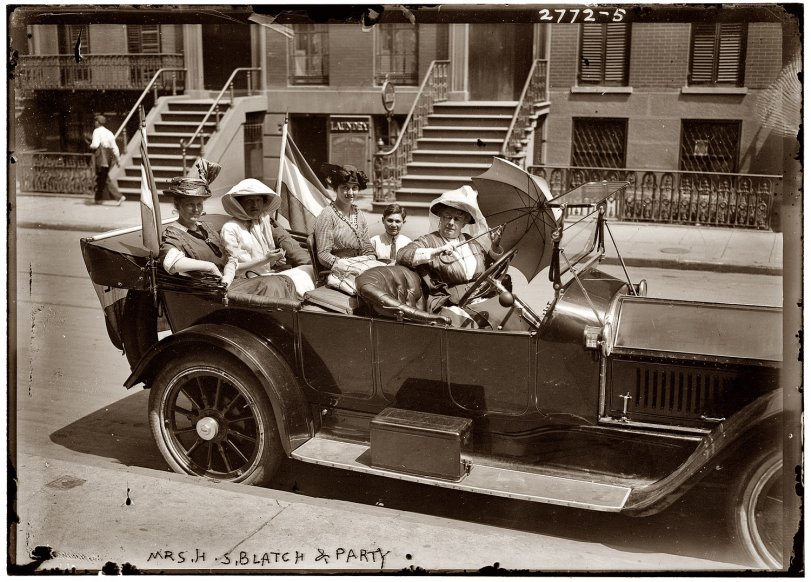 Photo of: Harriot Stanton Blatch: 1913 -- July 30, 1913, New York. Suffragist Harriot Stanton Blatch in the front seat of a Cole touring car with (from left) Susan Fitzgerald, Emma Bugbee and Maggie Murphy. View full size. 5x7 glass negative, George Grantham Bain Collection.