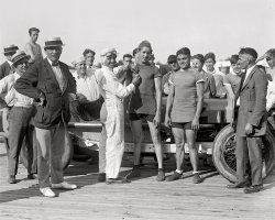 July 18, 1925. Laurel, Maryland. "Race car driver Peter De Paolo and Chas. Allen, Laurel bicycle races." National Photo Company glass negative. View full size.
Peter De Paolo
A legendPete DePaolo, now there's a legend.
ChafingThose cycling clothes are a huge chafe-fest waiting to happen. Owwwwwww! Thank God for Lycra!
Mild and woollyWool's actually not a bad material for cycling. It wicks sweat very well and it can be mde into a lighter material than you might think.
(The Gallery, Cars, Trucks, Buses, Natl Photo, Sports)