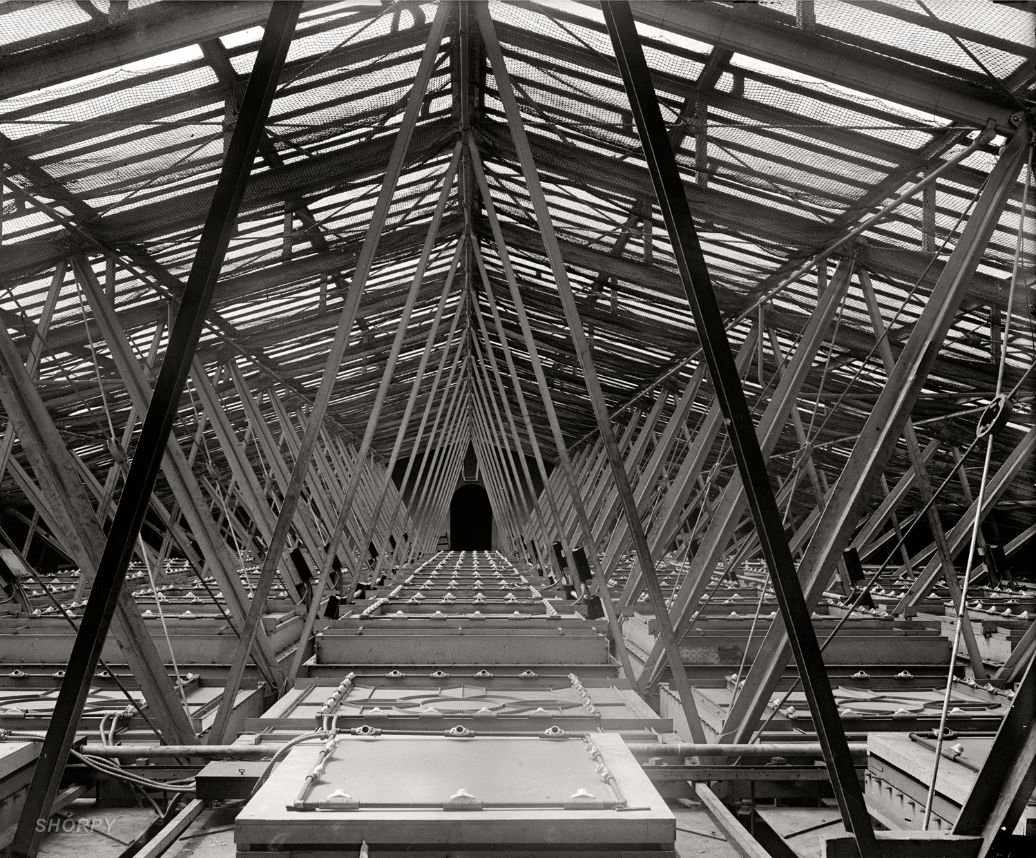 In political reportage there's a lot written about the House floor, but what about the ceiling? From 1925, a topside view of the House of Representatives in the U.S. Capitol. National Photo Company Collection glass negative. View full size.