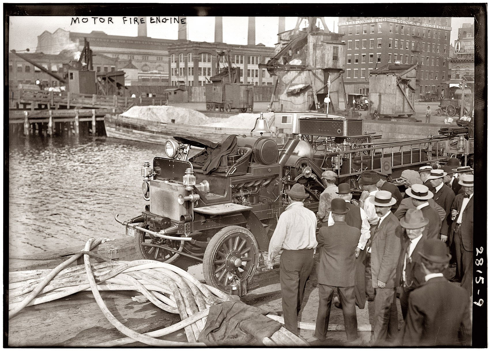 "Motor Fire Engine." Testing the FDNY hoses somewhere along the waterfront in 1913. View full size | Zoom in. George Grantham Bain Collection.
