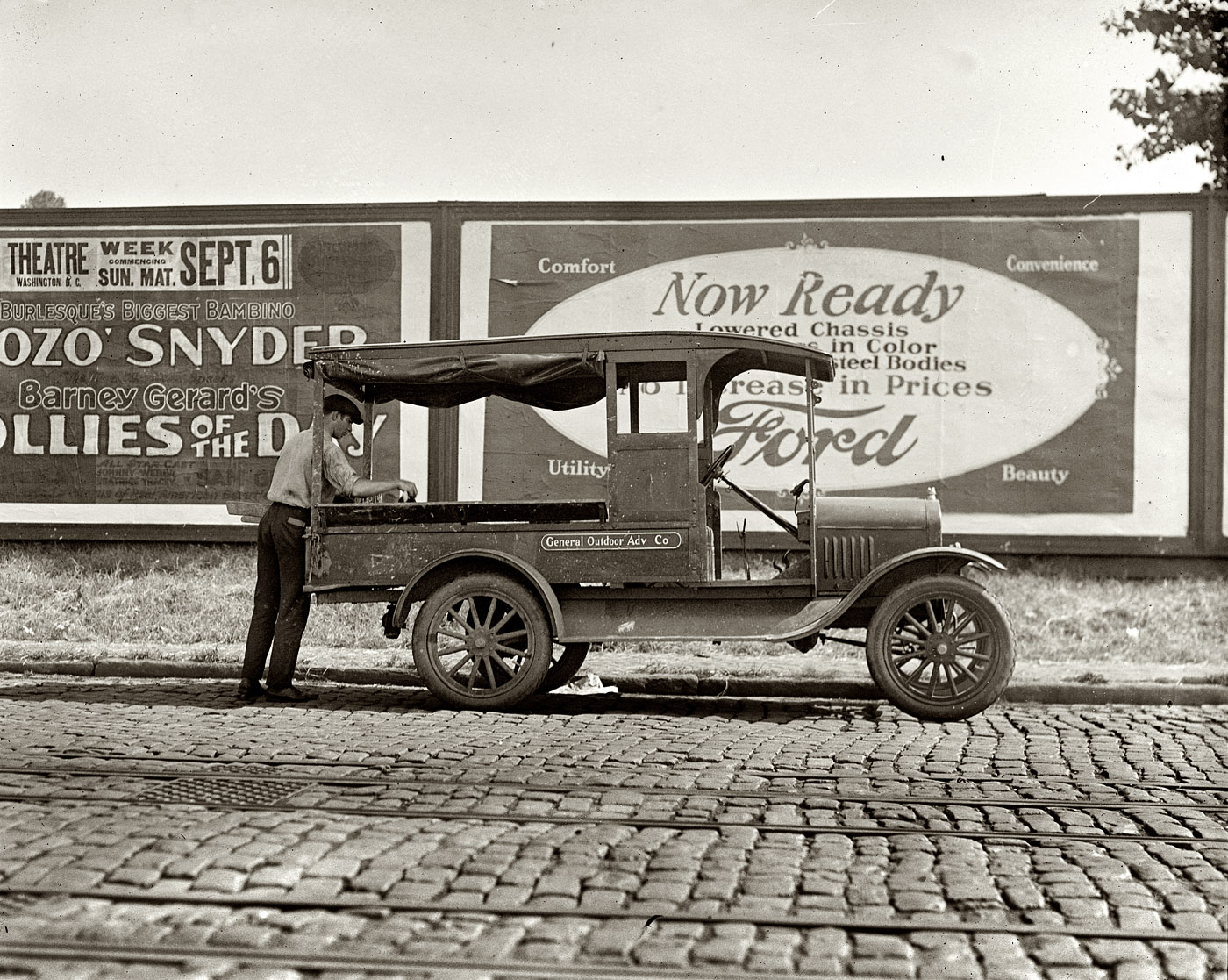 From 1925, another Ford at work (for a billboard company that advertises Fords) on the streets of greater Washington. View full size. National Photo Company.