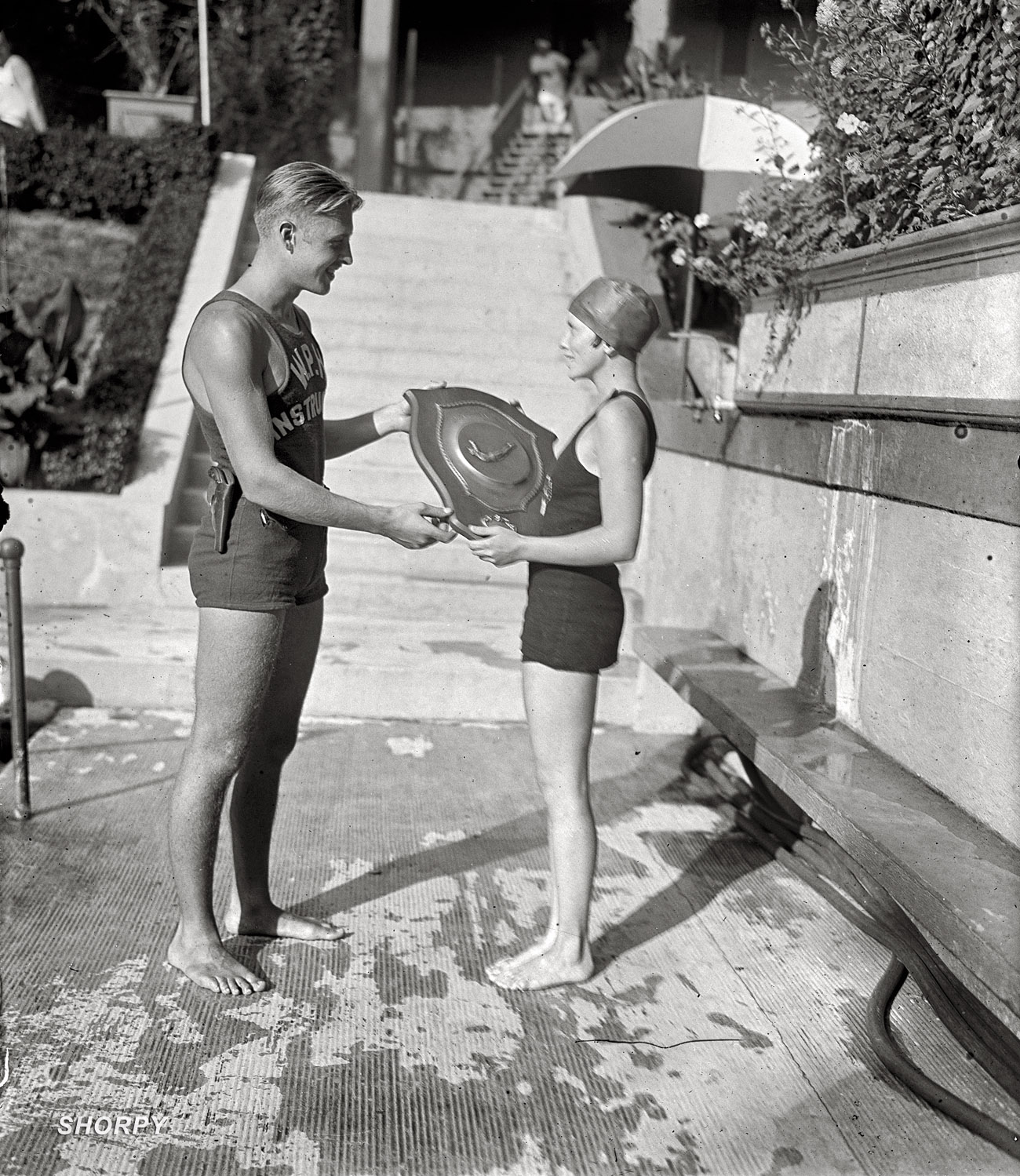 Washington, D.C., 1925. "Jerry Mangan and Ione Whalen, Wardman Park Pool." National Photo Company Collection glass negative. View full size.