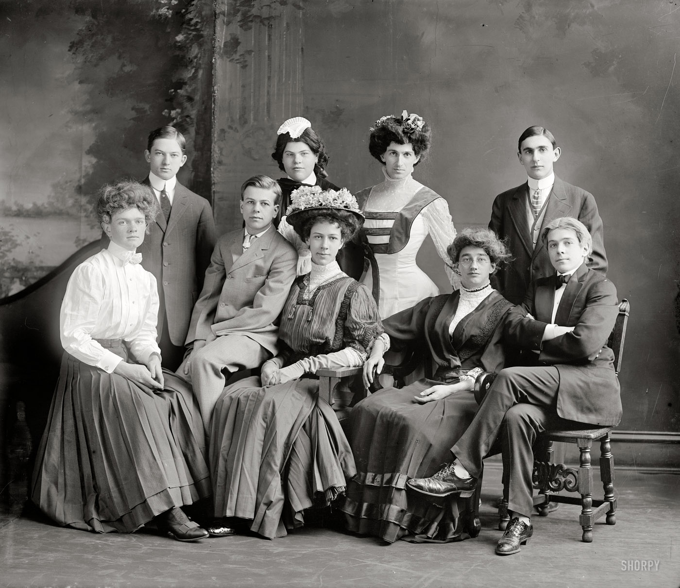 Circa 1910. "Washington School for Boys." Our second look these young men, and the lovely young women they've become. H&E glass negative. View full size.