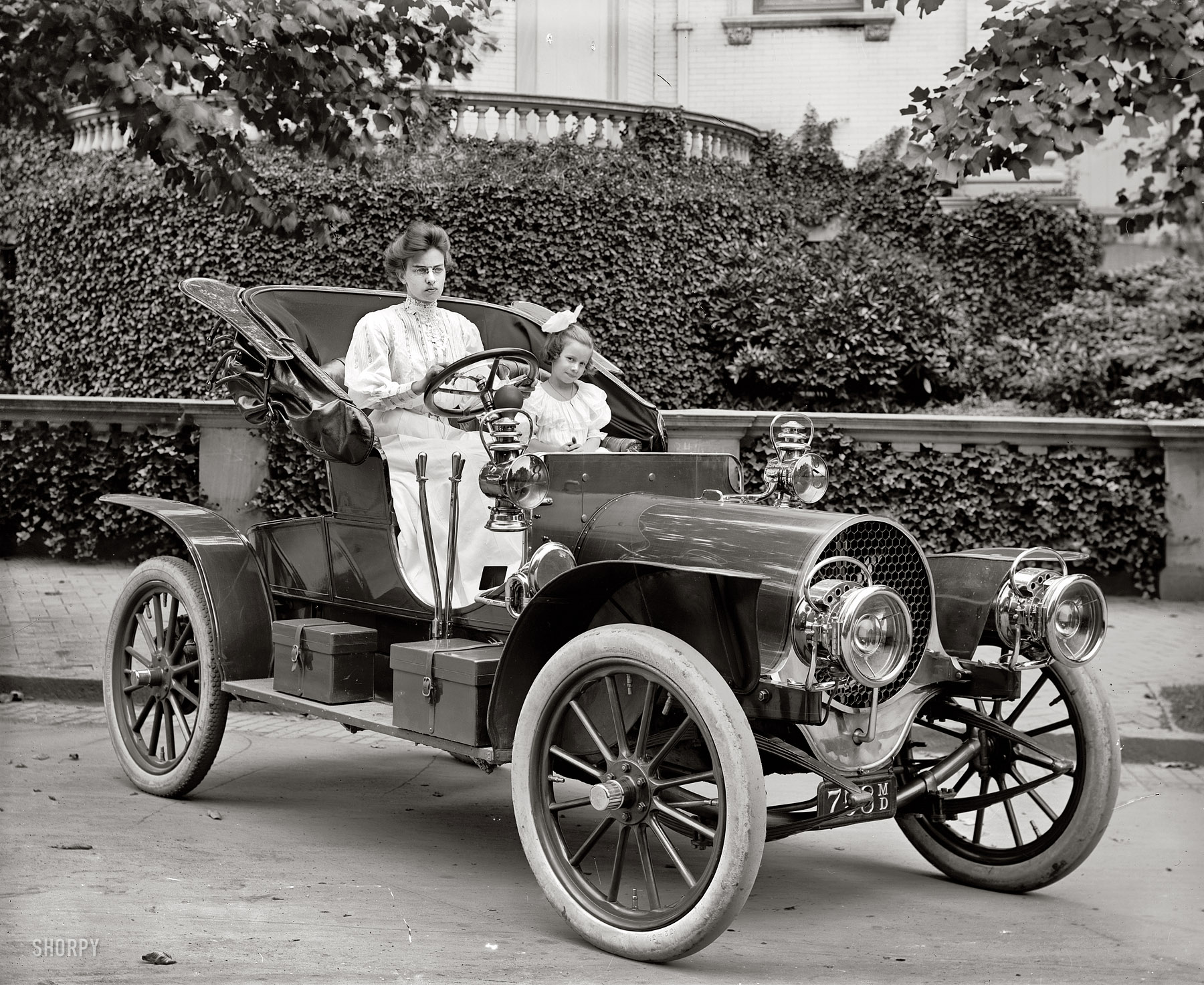 Washington, D.C., circa 1908. "Mrs. F.S. Bliven in auto." Husband Frank, who worked for Cook & Stoddard, the local Franklin automobile agency, made the newspapers for driving 35 miles with a broken steering knuckle. View full size.