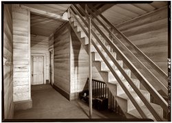 Stair to attic from the second-floor hallway at Woodburn, a circa 1830 plantation house in South Carolina, before its restoration in 1960. View full size. Photograph by Jack Boucher, Historic American Buildings Survey.