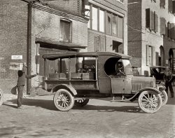 Washington, D.C., 1925. "Ford Motor Co." A delivery truck for Hugh Reilly Paint and Glass. View full size. National Photo Company Collection glass negative.
High tech inflatable tiresSo not everyone used those horrid solid things. I guess paint isn't as heavy as coal. 
How-ToAmusingly illustrated instructions for folding a pressman's hat.
HeadlightsLooks like one is set to check for potholes, the other set to look for squirrels.
The WatcherLove the guy standing back there having a smoke. As if he is saying "why dont you take a picture of me, I got a cool hat."
[It's a pressman's hat made of newsprint. With that and the other truck as clues I'd say we're at the Washington Daily News. - Dave]
(The Gallery, Cars, Trucks, Buses, D.C., Natl Photo)