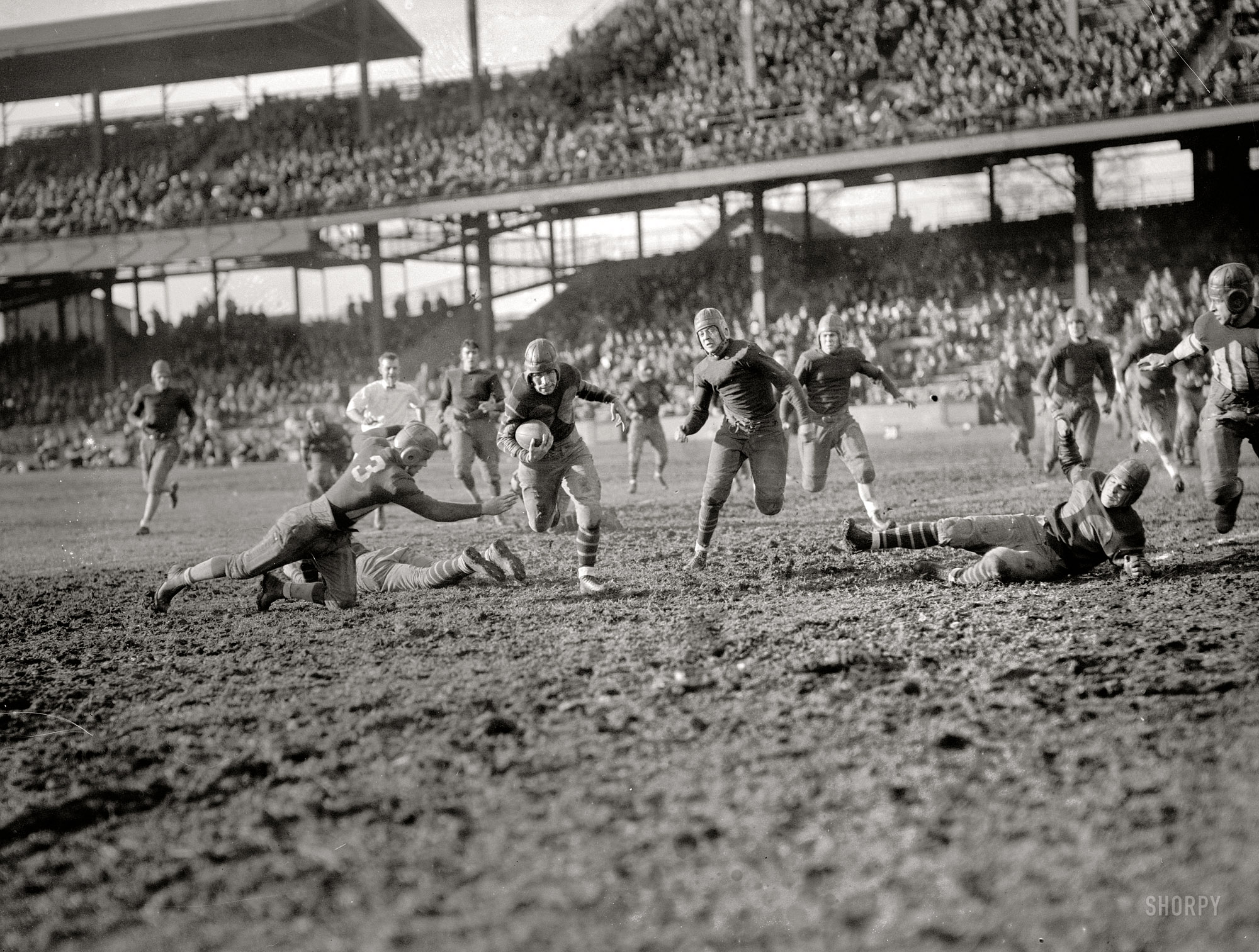 November 14, 1925. "Georgetown-Centre College game." Georgetown University takes on Kentucky's "Praying Colonels" at Griffith Stadium in Washington, D.C. National Photo Company Collection glass negative. View full size.
