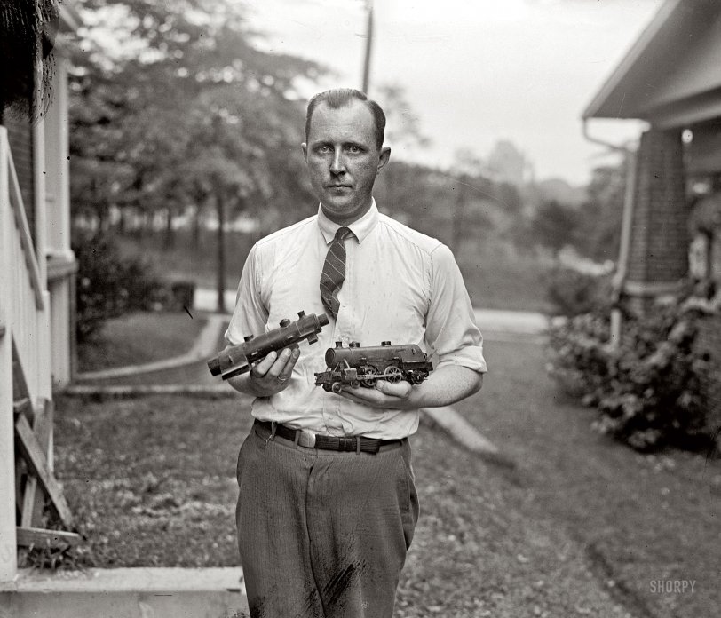 Dec. 11, 1925. Washington, D.C. "J.N. Swartzell with miniature railroad." Finally we see the man behind the trains. National Photo glass negative. View full size.
