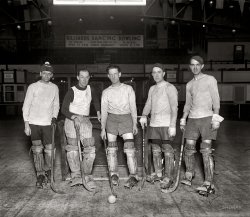Washington, D.C. January 15, 1926. "Arcade Roller Hockey Club." National Photo Company Collection glass negative, Library of Congress. View full size.
Game TonightWashington Post, Feb 7, 1926


Roller Hockey Game at Arcade Tonight

With the Palace pro courtmen not scheduled to use the Arcade until tomorrow night, a roller hockey game has been booked for tonight at 9:30 o'clock, when the Washington team will meet an all-star combination from Baltimore.  Skating will be permitted both before and after the game.
If local fans show enough interest in the roller skating sport, the Arcade management plans to bring some of the best teams in the country here.

Game FacesWhat a bloodthirsty-looking bunch. Could this be an early version of the Witness Protection Program?
(The Gallery, D.C., Natl Photo, Sports)