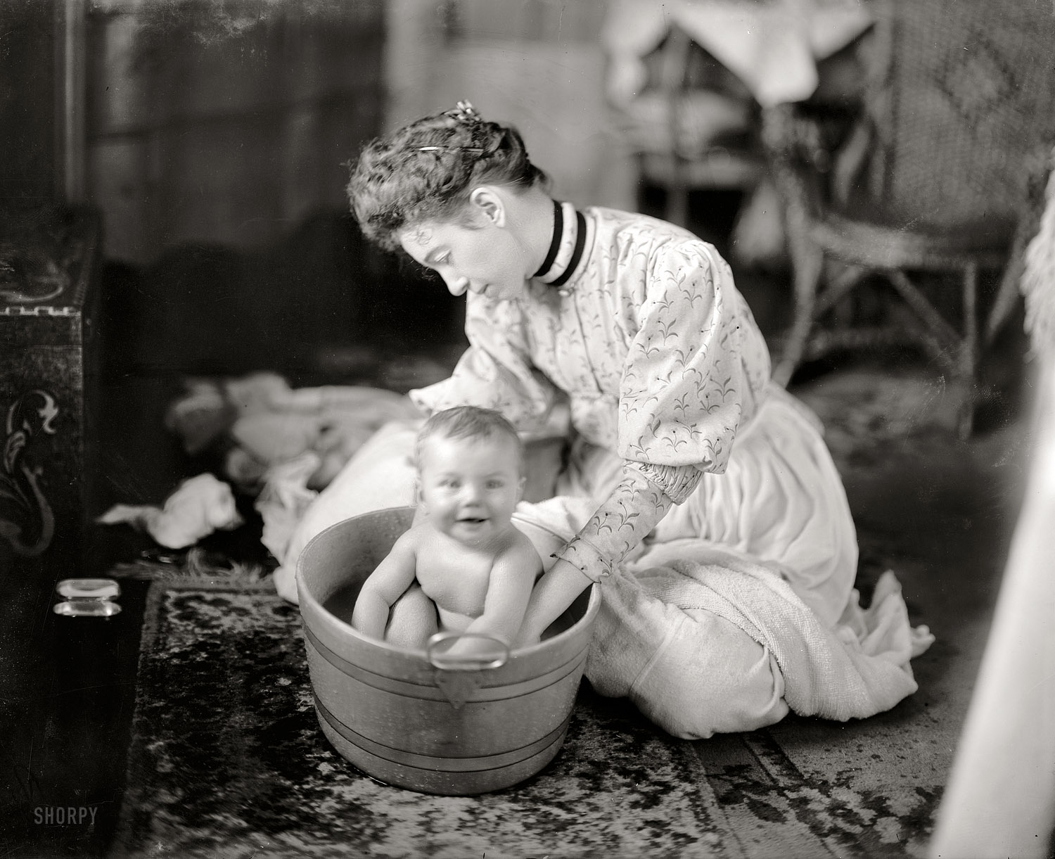 Circa 1905. "Martha Harris. Baby being washed." Maybe one (or two) of the Harrises of Harris & Ewing. Harris & Ewing glass negative. View full size.