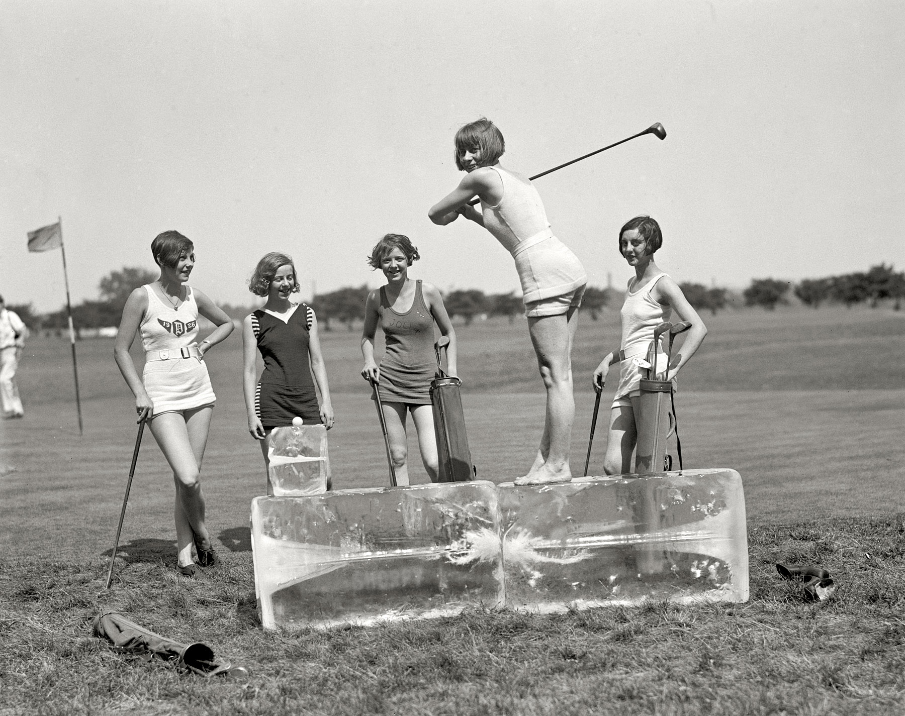July 9, 1926. "Golf in bathing suits -- icing off at the tee. Miss Dorothy Kelly teeing off on a cake of ice. The others in the group are Misses Virginia Hunter, Elaine Griggs, Hazel Brown, and Mary Kaminsky of the Washington, D.C. area." Previously spied here and here, and in color here. View full size.