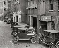 Washington, D.C., 1926. "Ford Motor Co." The McReynolds & Sons garage, L Street at Vermont Avenue. National Photo glass negative. View full size.