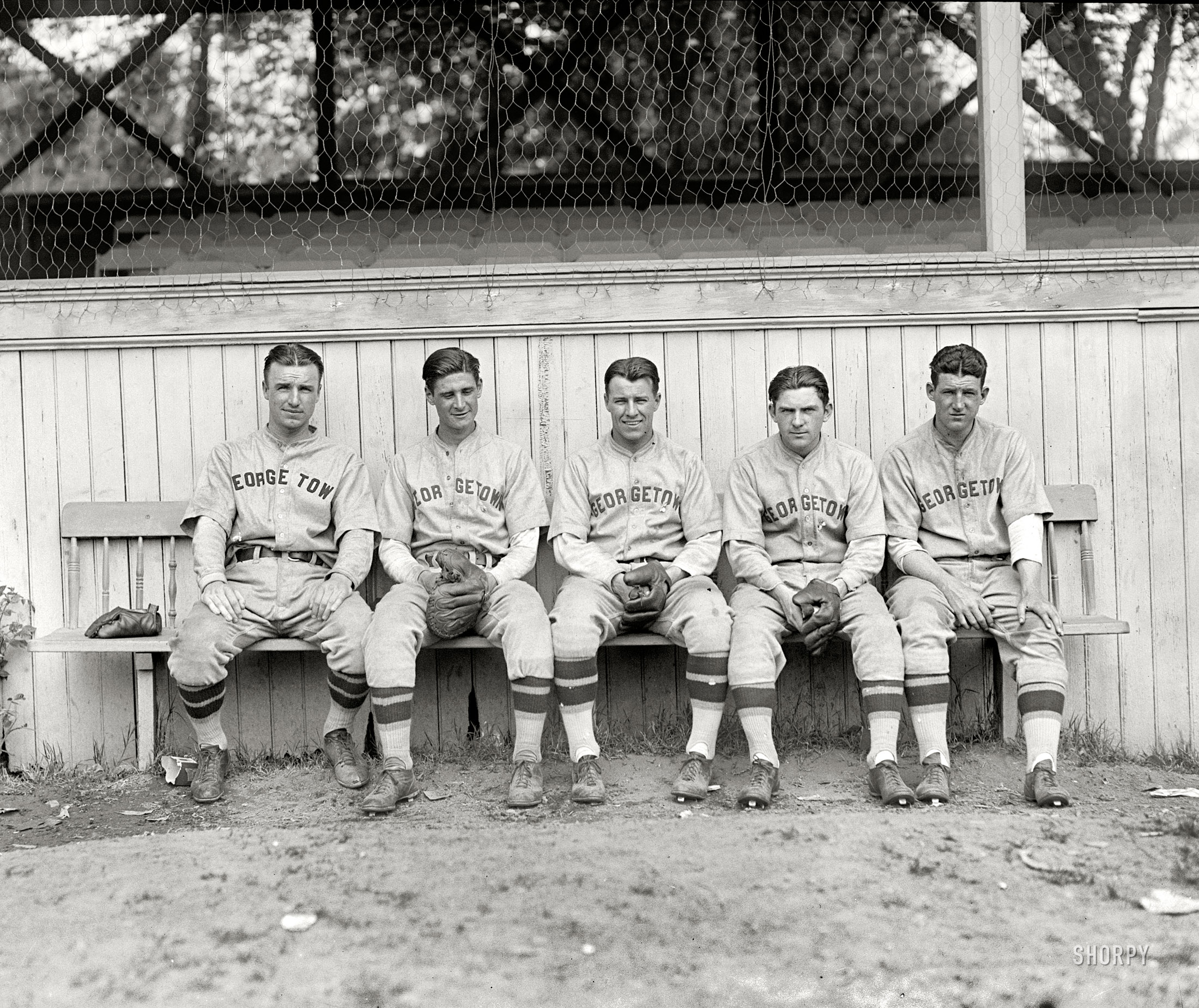 Washington, D.C. "Georgetown U., 1928." A narrow range of parting preferences on view here. National Photo Company Collection glass negative. View full size.