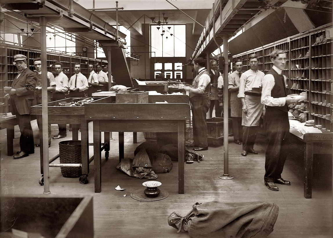 "Boxing mail in the New York post office." View full size. Circa 1913. 5x7 glass negative, George Grantham Bain Collection. Note the spittoon.