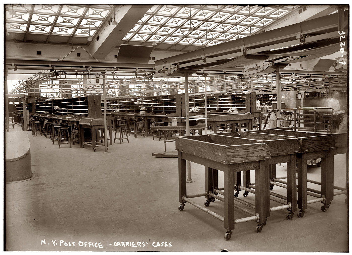 "N.Y. Post Office carriers' cases," circa 1912. View full size. George Grantham Bain Collection.