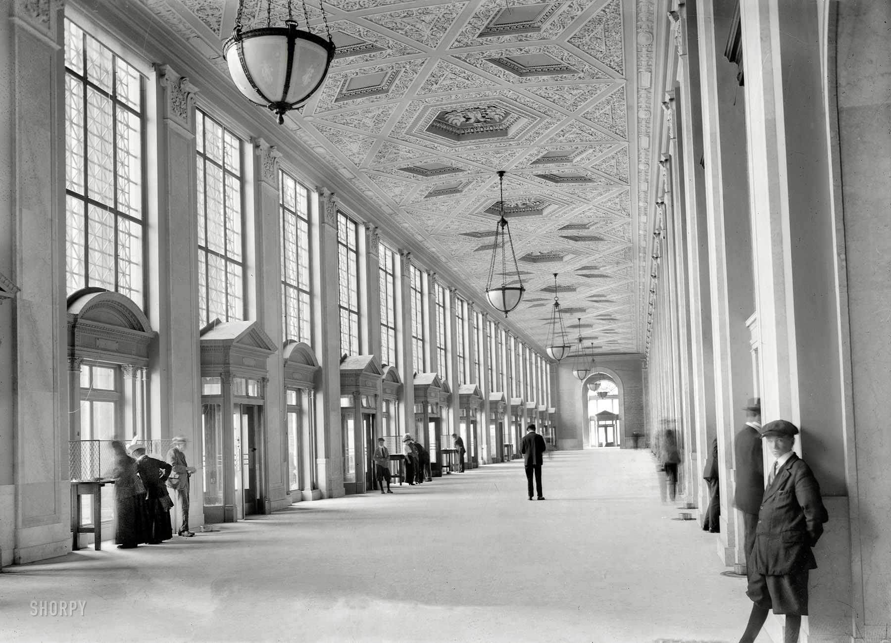 Circa 1916. "New York Post Office, main corridor." Snapshot from the Golden Age of Mail. 5x7 glass negative, George Grantham Bain Collection. View full size.