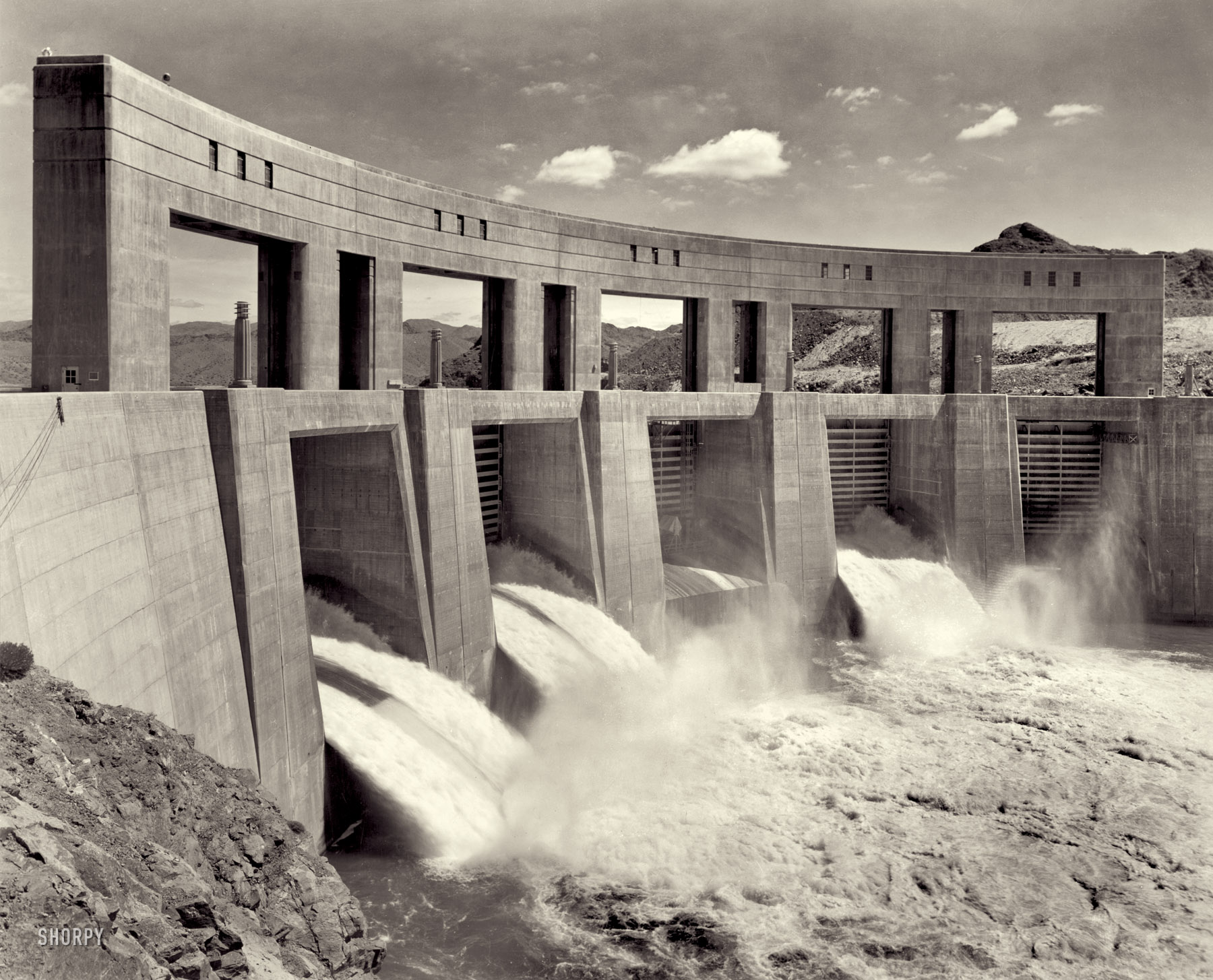 June 1941. "Parker Dam power project. View from California side into Arizona." Gelatin silver print by Ben Glaha, Bureau of Reclamation. View full size.