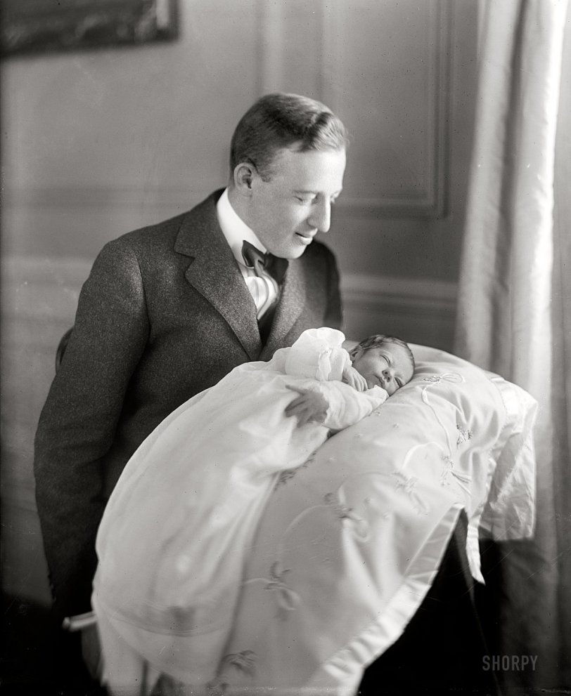 1915. Washington, D.C. "Francis Sayre Jr., baby, with father." Woodrow Wilson's son-in-law Francis B. Sayre with the President's new grandson. Harris &amp; Ewing Collection glass negative. View full size. Happy Father's Day from Shorpy.
