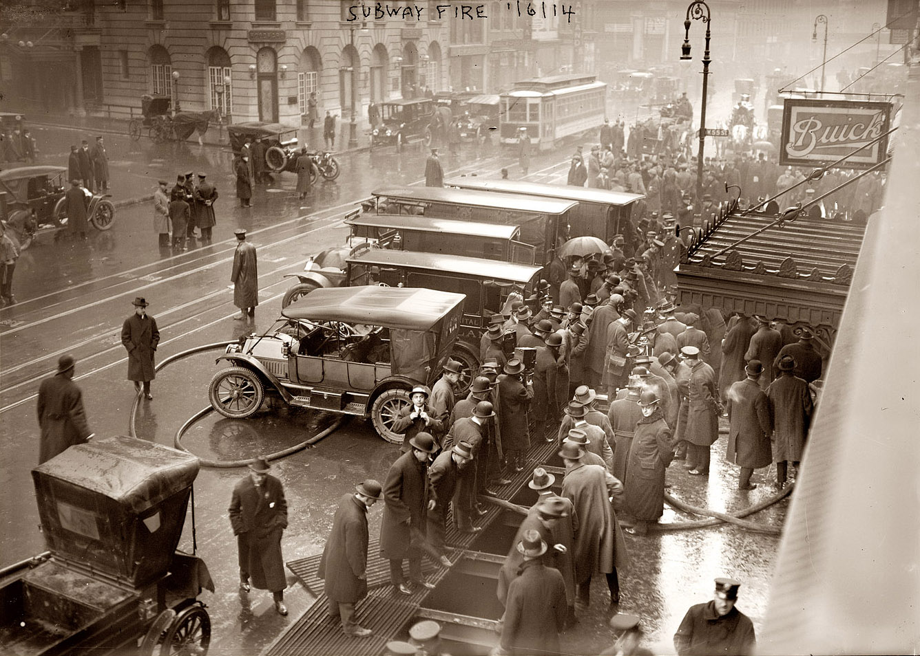 On January 6, 1915, an electrical short in a manhole started a fire that filled the subway line under Broadway at West 55th Street with smoke, resulting in chaos for a quarter-million commuters. The New York Times reported that one person, Ella Grady, was killed. We note that photographer George Grantham Bain, like many of us writing checks just after January 1, was a year off in dating this photo. View full size. 5x7 glass negative, George Grantham Bain Collection.