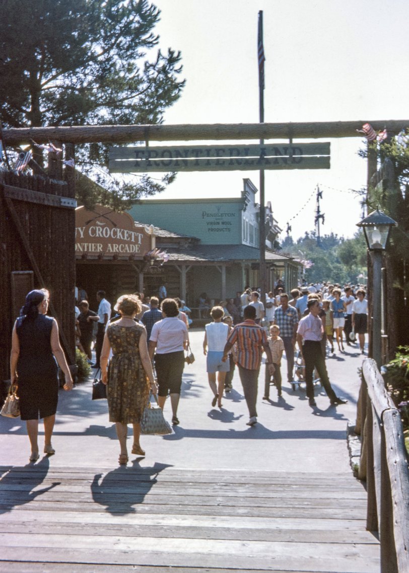 Entrance to Frontierland, August 1963. Disneyland was my favorite place in the whole world even before I ever got there. Over the course of several trips starting in 1960, I took hundreds of color slides, but apparently this Kodachrome is the only photo actually showing me there. The first one who spots me gets a free E ticket for the Mine Train Through Nature's Wonderland.
