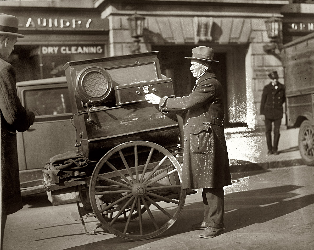 A street vendor and his radio-equipped cart circa 1928 in Washington, D.C. View full size. 4x5 glass negative from the National Photo Company Collection.